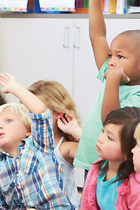 Children raising their hand